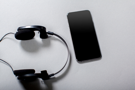 Audio Headphones with Cord on Grey Backgroundの写真素材