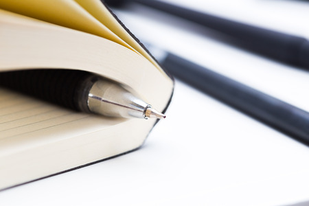 Pen and notebook close upの写真素材
