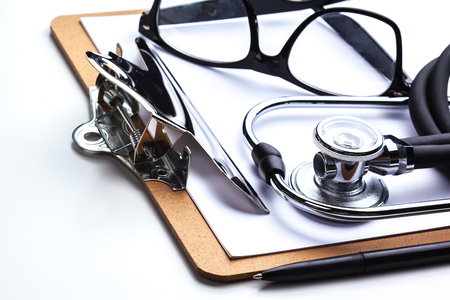 Empty prescription  lying on table with stethoscopeの写真素材