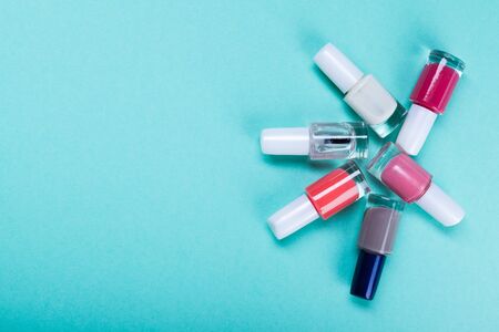 cosmetics on blue workplace. Top viewの写真素材
