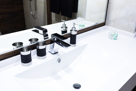 washbasin and faucet at homeの写真素材