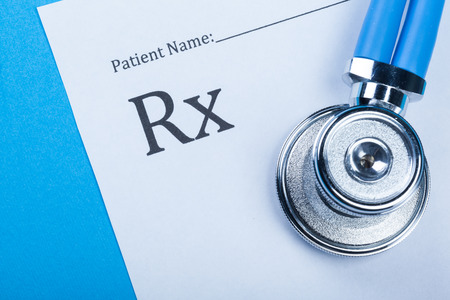 Closeup of a stethoscope on a rx prescriptionの写真素材