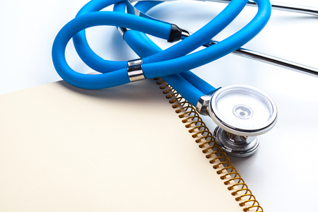 Empty prescription  lying on table with stethoscopeの写真素材