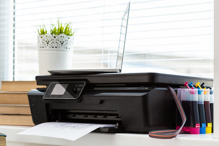 Printer and computer. Office tableの写真素材
