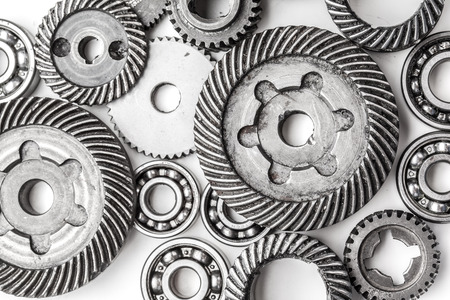Gear metal wheels, isolated on white backgroundの写真素材