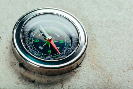 Compass on a gray gradient backgroundの写真素材