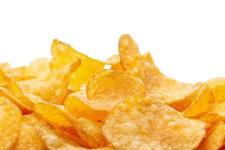 Potato chips isolated on white backgroundの写真素材