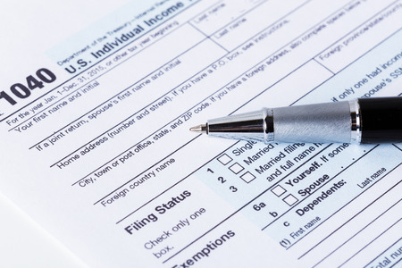 Income tax form and penの写真素材