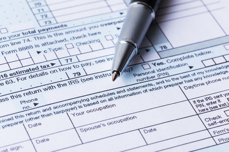Income tax form and penの写真素材