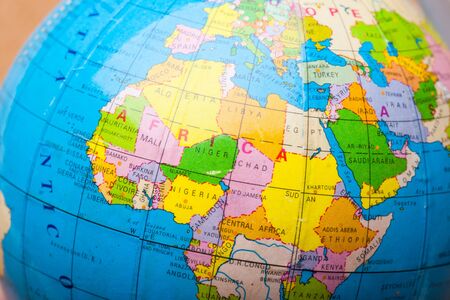 Travel destination points on a map indicated with colorful thumbtacksの写真素材