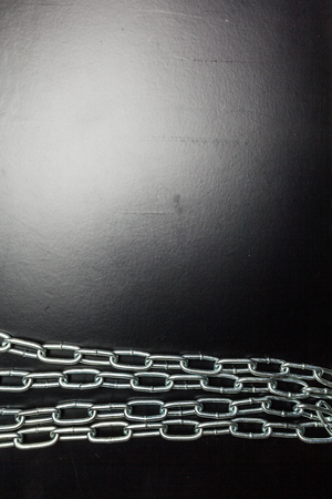 chains on a black backgroundの写真素材