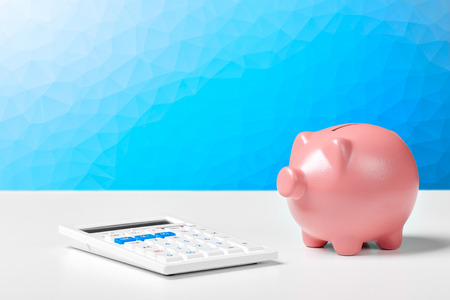 Pink Piggy Bank With Calculatorの写真素材
