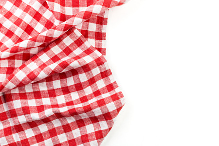 red folded tablecloth isolated on whiteの写真素材