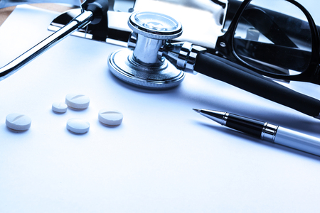 Empty prescription  lying on table with stethoscopeの写真素材
