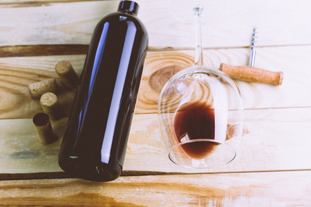 Glass and bottle with red wineの写真素材