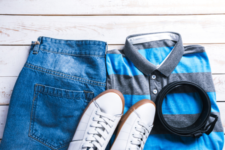 cool fashion casual men outfit on wooden tableの写真素材