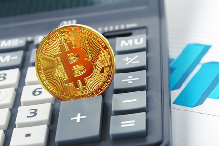 bitcoin coin and calculatorの写真素材