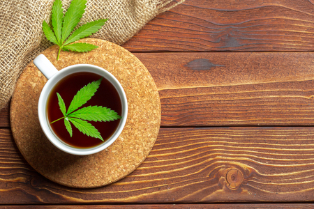 Cannabis herbal tea and marijuana leavesの写真素材