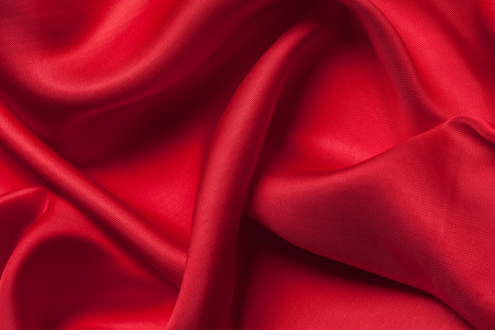 Red cloth waves background textureの写真素材