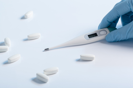 thermometer and pillsの写真素材