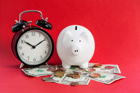 White piggy bank and US dollarsの写真素材