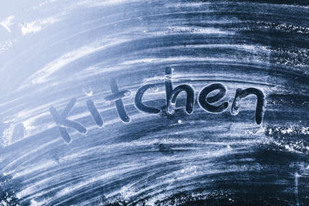 Dark wooden background with flour dustの写真素材