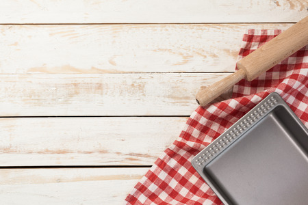 Various kitchen utensils on wooden tableの写真素材