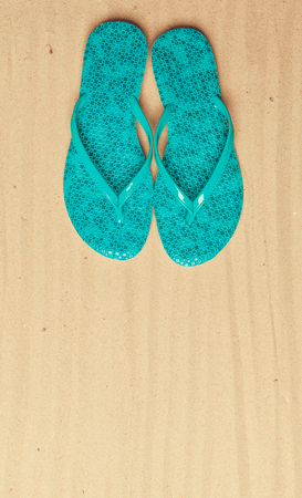flipflops on beachの写真素材