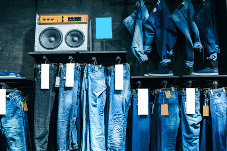 clothes on hanger in shopの写真素材