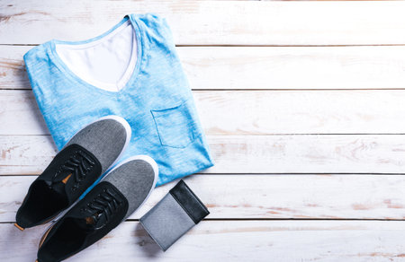 cool fashion casual men outfit on wooden tableの写真素材