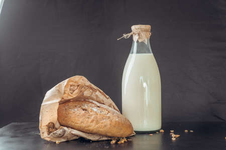 glass of milk and breadの写真素材