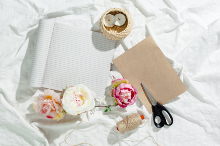 flowers with empty vintage notebook for your designの写真素材