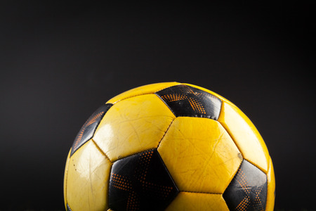 soccer ball on the green fieldの写真素材