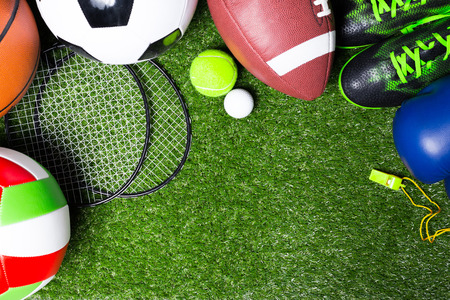 Various sport tools on grassの写真素材