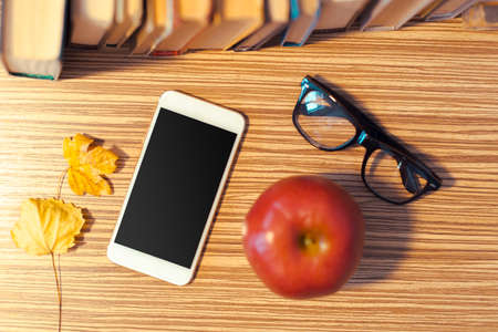 Smartphone on wooden tableの写真素材