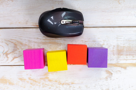 computer mouse on a wooden backgroundの写真素材