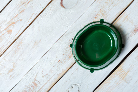 pet bowl on a grey wooden tableの写真素材