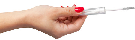woman hand holding eyelash brushの写真素材