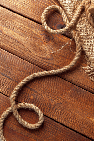 ship rope at wooden backgroundの写真素材