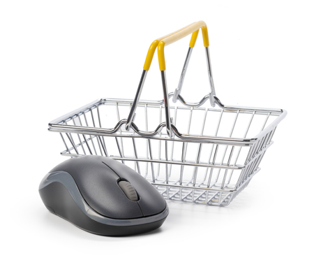 Computer mouse and shopping basketの写真素材