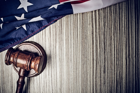 the judge gavel and background with usa flagの写真素材