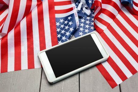 Us flag and smartphoneの写真素材