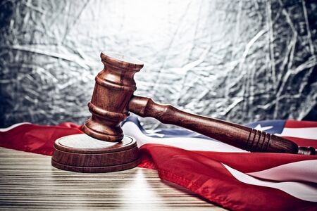 the judge gavel and background with usa flagの写真素材