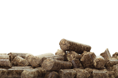 stack of wooden pellets for bio energy, white background, isolated