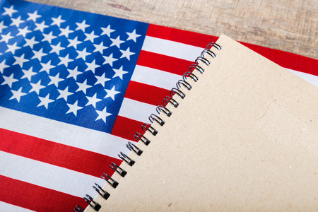 open book on American flagの写真素材
