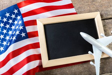 Blank chalk board with American Flagの写真素材