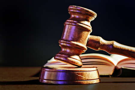 Judge's Gavel over black background