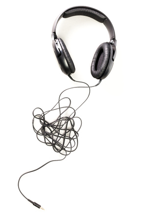 black headphones isolated on whiteの写真素材