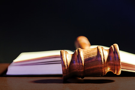 Judge's Gavel over black background