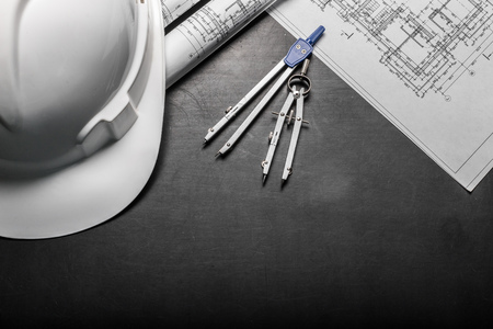 Construction planning drawings on black backgroundの写真素材